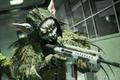 Warzone player holding SMG while wearing spooky rabbit mask